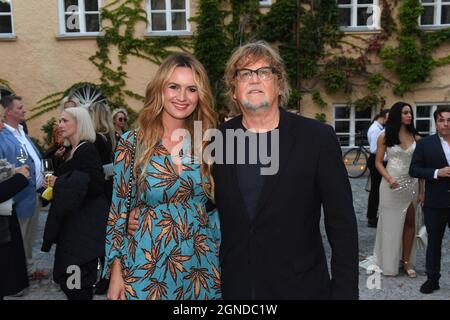Munich, Germany. 24th Sep, 2021. Media manager Martin Krug shows off with his girlfriend Martina Nicia 'Movie Meets Media' on the Praterinsel. The film industry discussed and celebrated in summery temperatures. Credit: Felix Hörhager/dpa/Alamy Live News Stock Photo