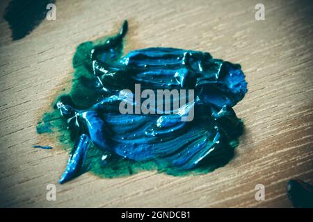 Smears of oil paint on the palette Stock Photo