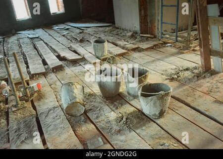 old dirty bucket at a construction site Stock Photo