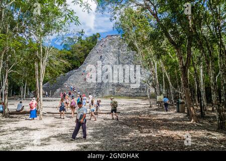 COBA, MEXICO - MARCH 1, 2016: Tourist visit the Pyramid Nohoch Mul at the ruins of the Mayan city Coba, Mexico Stock Photo