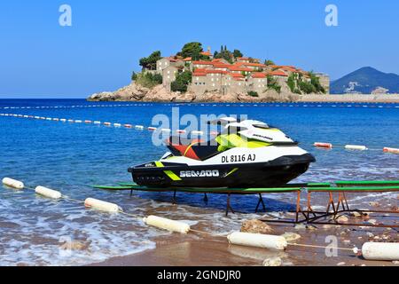 Close-up of a jet ski (water scooter) at Sveti Stefan Beach across the beautiful islet of Sveti Stefan, Montenegro Stock Photo