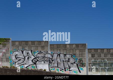 Graffiti reading SAWR on a soundproofing wall of an expressway in Kanagawa, Japan, Stock Photo