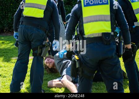 Melbourne, Australia. 25th Sep, 2021. 25th September 2021, Melbourne, Australia. Police arrest a potential anti-lockdown protester in St Kilda before a planned rally was to take place. Credit: Jay Kogler/Alamy Live News Credit: Jay Kogler/Alamy Live News