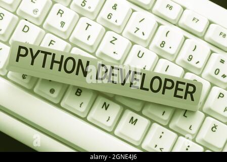 Text sign showing Python Developer. Business showcase responsible for writing serverside web application logic Downloading Online Files And Data Stock Photo