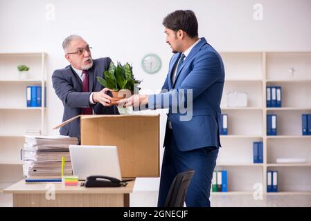 Two employees in dismissal concept Stock Photo