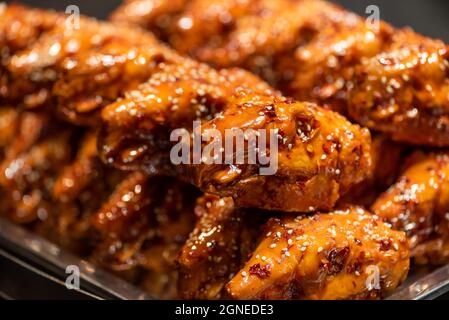 Sichuan traditional hot and spicy rabbit heads selling at market stall in Chengdu, Sichuan province, China Stock Photo