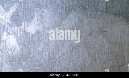 Silver painted background texture of paint on canvas. High quality photo Stock Photo