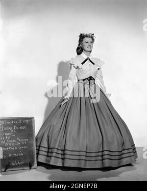IRENE DUNNE Costume Test Reference Still for ANNA AND THE KING OF SIAM 1946 director JOHN CROMWELL based on the biography by Margaret Landon screenplay Talbot Jennings and Sally Benson music Bernard Herrmann costumes Bonnie Cashin Twentieth Century Fox Stock Photo