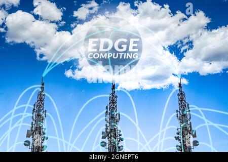 Telecommunication towers connected to each other and the cloud. Edge computing concept Stock Photo