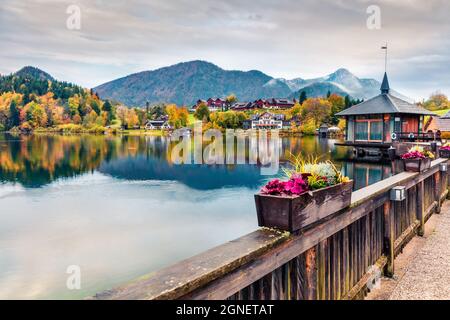 Captivating autumn sunrise on Grundlsee lake. Amazing morning scene of Brauhof village, Styria stare of Austria, Europe. Colorful view of Alps. Travel Stock Photo
