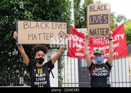 Geneva, Britain. 30th Aug, 2020. Protesters hold placards with anti-racism messages during the Million People March demonstration to protest against systemic racism in the UK in London, Britain, Aug. 30, 2020. Credit: Ray Tang/Xinhua/Alamy Live News Stock Photo
