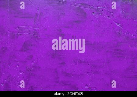 carelessly painted purple flat surface - texture and full frame background Stock Photo