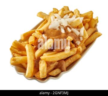High angle of yummy deep fried potato sticks with cut fresh onion and smooth sauce in bowl on white background Stock Photo