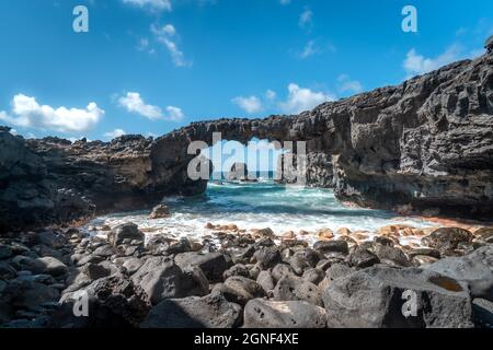 rocky beach with a natural arch in Las Puntas. El Hierro island. Canary Islands Stock Photo
