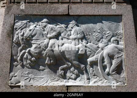 Detail of marble relief on north panel of Union Soldiers and Sailors Monument showing cavalry and infantry charge, Wyman Park Dell, Baltimore, USA Stock Photo