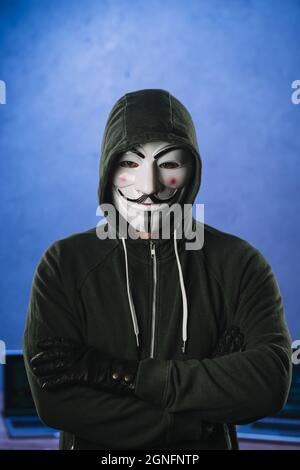 hacker with anonymous mask. High quality and resolution beautiful photo concept Stock Photo