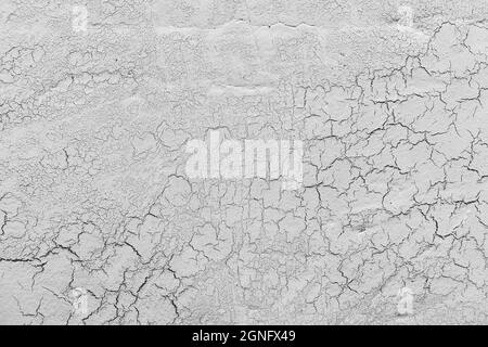 grey lime plaster with cracks background. High quality and resolution beautiful photo concept Stock Photo