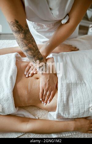 A Girl in a White T-shirt Massages the Groin. Gynecology Problems Stock  Photo - Image of background, girl: 172264378