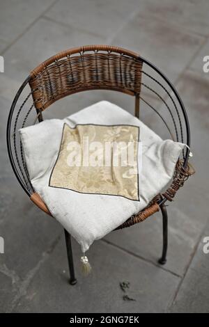 Metal and rattan Chinese circle chair-white cushion-Shuyuanmen Calligraphy Street. Xi'an-China-1580 Stock Photo