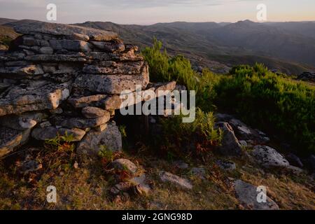 Cortelho, a small, rudimentar, stone-built shelter used by sheperds when herding cows in the highlands of the Soajo mountains. Stock Photo