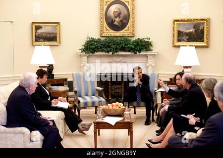 President Barack Obama listens to Interior Secretary Ken Salazar during an Oval Office meeting on the regulation of mountaintop mining, June 9, 2009. From left, Terrence 'Rock' Salt, acting Assistant Secretary of the Army for Civil Works; Lisa Jackson, EPA Administrator; the President; Nancy Sutley, Chair of the Council on Environmental Quality; Sec. Salazar; and Carol Browner, Assistant to the President for Energy and Climate Change.  (Official White House Photo by Pete Souza) This official White House photograph is being made available for publication by news organizations and/or for persona