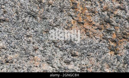 Granite surface. Texture of granite stone. Cracked natural stone surface. Copy space Stock Photo