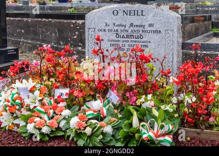 Timoleague, West Cork, Ireland. 25th Sep, 2021. The grave of IRA member Diarmuid O'Neill, who was shot and killed by the Metropolitan Police on 23rd September, 1996, is covered with flowers and wreaths on the eve of the official 25th anniversary of O'Neill's death. Former Republican prisoner, hunger striker and Sinn Féin TD, Martin Ferris, will be the guest speaker at tomorrow's event. Credit: AG News/Alamy Live News Stock Photo