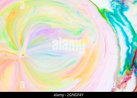 Multicolored lines and spots on liquid surface. Abstract background made with fluid art technique. Trendy colorful backdrop. Fluid art Stock Photo