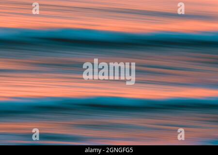 Bright pink-blue fluorescent futuristic background, sea waves at sunset, fine art, copy space Stock Photo