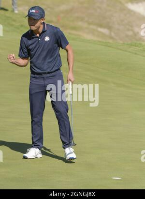 Kohler, United States. 25th Sep, 2021. Team USA's Collin Morikawa celebrates sinking his putt for the match win on the 17th green in the 43rd Ryder Cup at Whistling Straits on Saturday, September 25, 2021 in Kohler, Wisconsin. Photo by Mark Black/UPI Credit: UPI/Alamy Live News Stock Photo