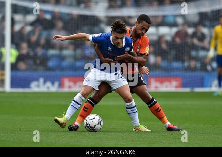 ROCHDALE, UK. SEPT 25TH Oldham Athletic's Jordan Clarke tussles with Danny Cashman of Rochdale AFC during the Sky Bet League 2 match between Rochdale and Oldham Athletic at Spotland Stadium, Rochdale on Saturday 25th September 2021. (Credit: Eddie Garvey | MI News) Credit: MI News & Sport /Alamy Live News Stock Photo