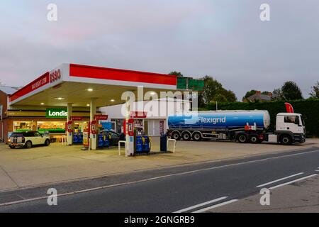 Winterbourne Abbas, Dorset, UK.  25th September 2021.  A Flexigrid fuel lorry resupplying the ESSO petrol station at Winterbourne Abbas in Dorset after a day of panic buying by motorists.  Picture Credit: Graham Hunt/Alamy Live News Stock Photo