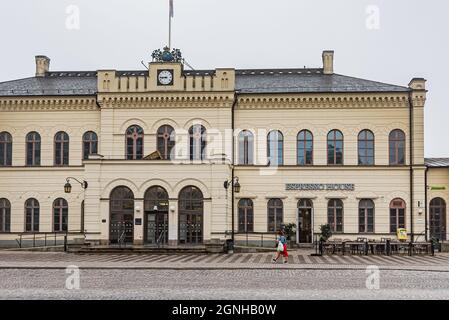 Girl walking outside the central station in Lund, Sweden, 11 September 2021 Stock Photo