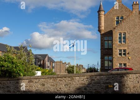 Shetland flag flies above Lerwick, Shetland Islands, Scotland, UK Stock Photo