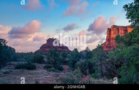 Bell Rock in Sedona Arizona with beautiful puffy sunset clouds Stock Photo
