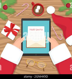Santa claus is sitting at his workplace desk and receiving letter on his tablet - vector flat design illustration Stock Vector