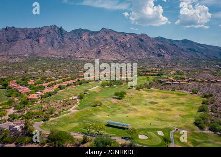 Golf course in Tucson Arizona Catalina Foothills with mountains in distance Stock Photo
