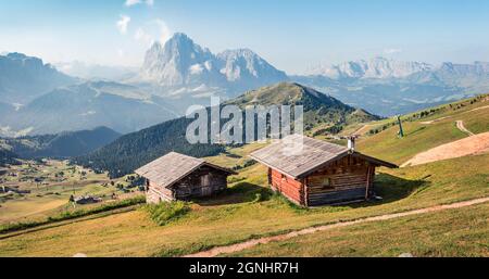 Sunny summer view of Sassolungo (Langkofel) range in National Park Dolomites, South Tyrol, Italy, Europe. Amazing morning scene of Gardena valley, Dol Stock Photo