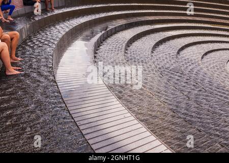 The Darling Harbour Woodward Water Feature is a heritage-listed water fountain located at Harbour Promenade, Darling Harbour, City of Sydney, New Sout Stock Photo