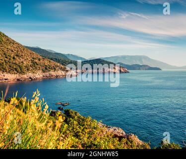 Sunny summer view from Ierussalim Beach. Picturesque morning seascape of Ionian sea. Impressive sunrise on Kefalonia Island, Greece, Europe. Traveling Stock Photo