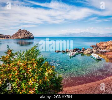 Calm spring seascape of Ionian sea. Attractive morning view of small beach in northeastern Corinthia, Greece. Sunny outdoor scene of the Greek resort. Stock Photo