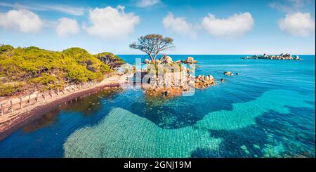 View from flying drone. Stunning spring view of Tamaricciu beach. Aerial morning scene of Corsica island, France, Europe. Impressive Mediterranean sea Stock Photo