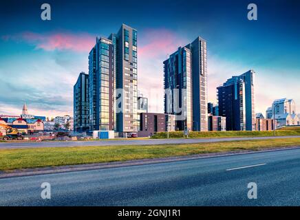 Fantastic cityscape of Reykjavik with Luxury Apartment Downtown. Incredible summer morning on Atlantic Ocean Quay, Iceland, Europe. Traveling concept Stock Photo