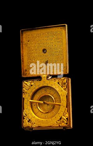 gentleman's mobile pocket watch in form of sundial very old the writing is a hail mary Stock Photo