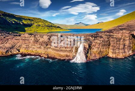 Aerial view from drone of Sorvagsvatn lake on cliffs of Vagar island in ...