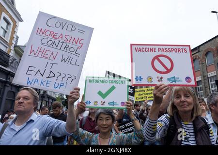 London, UK. 25th Sep, 2021. Protestors seen holding placards saying 'COVID means increasing control. When will it end? Wake up!' during the demonstration.The Anti-vaccine protest, led by StandupX, took place from hyde park corner and ended at Clapham Common. Protestors gathered to protest against vaccine passports, to stand for medical freedom and to protect children. (Photo by Belinda Jiao/SOPA Images/Sipa USA) Credit: Sipa USA/Alamy Live News Stock Photo