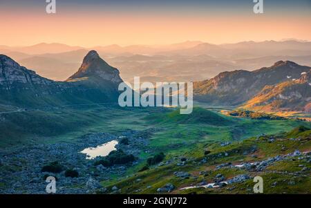 Fantastic sunrise in Durmitor National Prk, Montenegro, Europe. Exciting summer view from Sedlo pass. Beautiful world of Mediterranean countries. Stock Photo