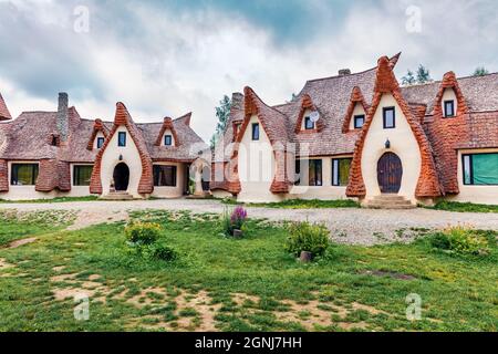 VALLEY OF FAIRIES, ROMANIA - JULY 2018: Castelul de Lut, Valea Zanelor is a Transylvanian Hobbit castle built of clay and sand in Romania, Transylvani Stock Photo