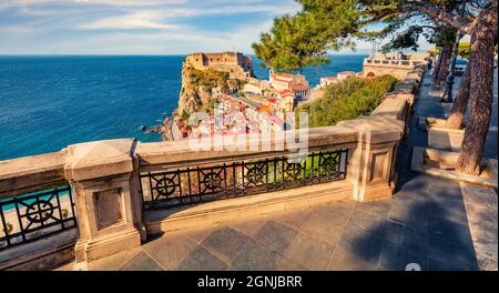 Bright spring view of Scilla town with Ruffo castle on background, administratively part of the Metropolitan City of Reggio Calabria, Italy, Europe. C Stock Photo