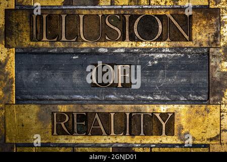 Illusion of Reality text on textured grunge copper and vintage gold background Stock Photo